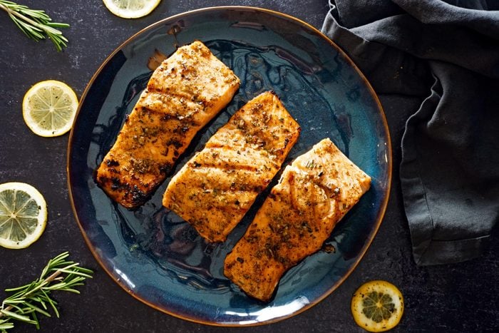 Grilled Salmon on a blue ceramic plate